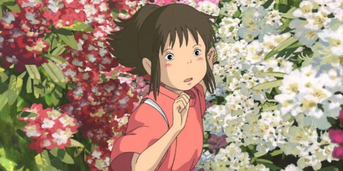 Chihiro follows Haku through the flowers