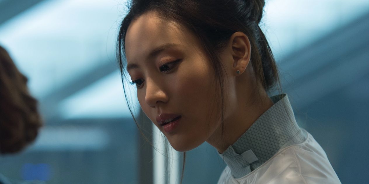 Helen Cho looking over something in Avengers: Age of Ultron