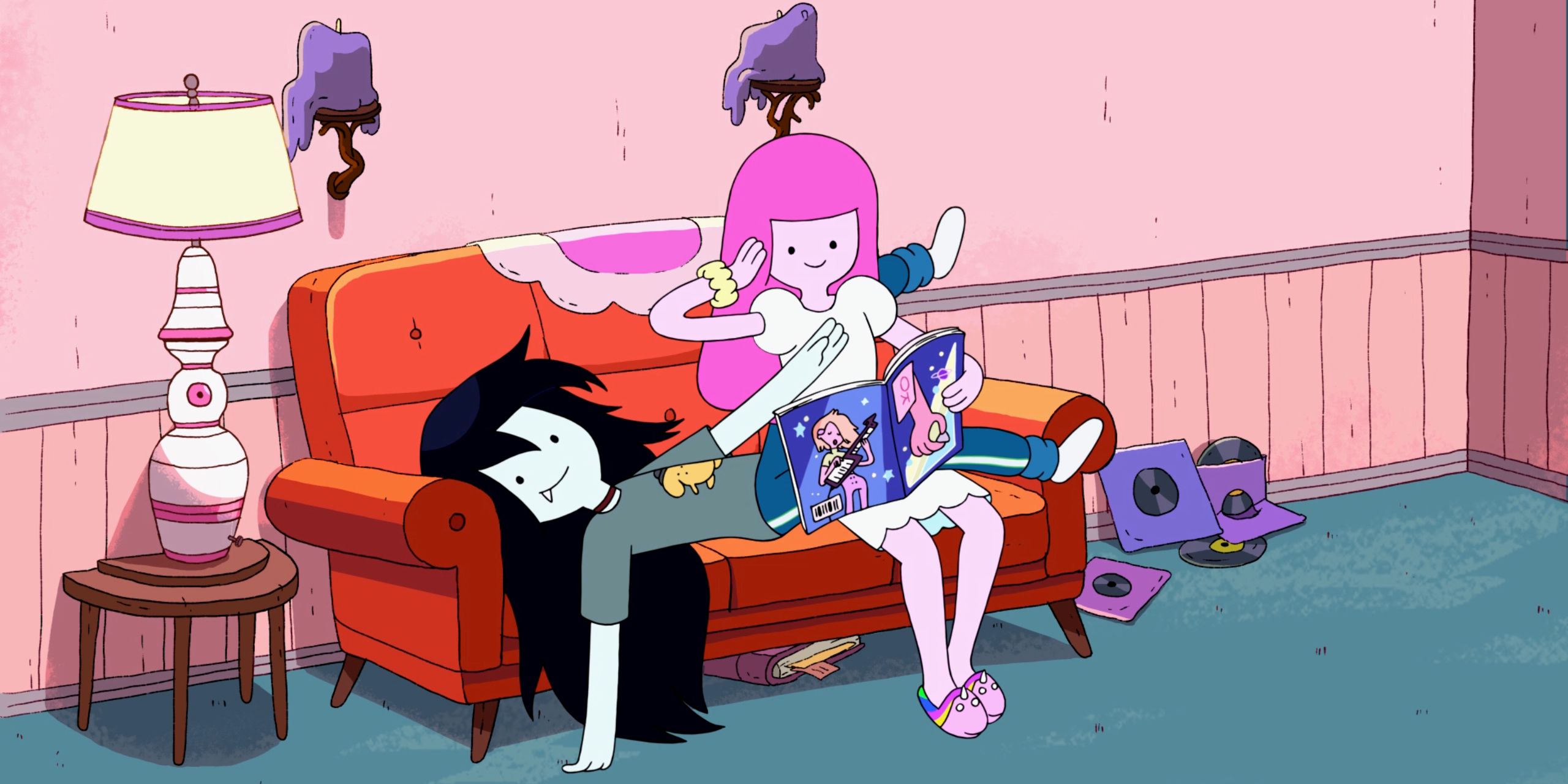 Marceline and Bonnibel relaxing on a couch