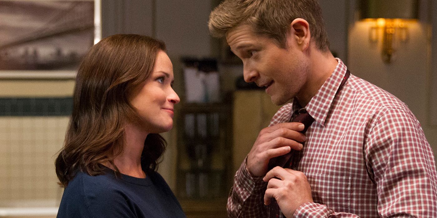 Gilmore Girls' Logan and Rory look at each other smiling in the A Year in the Life revival