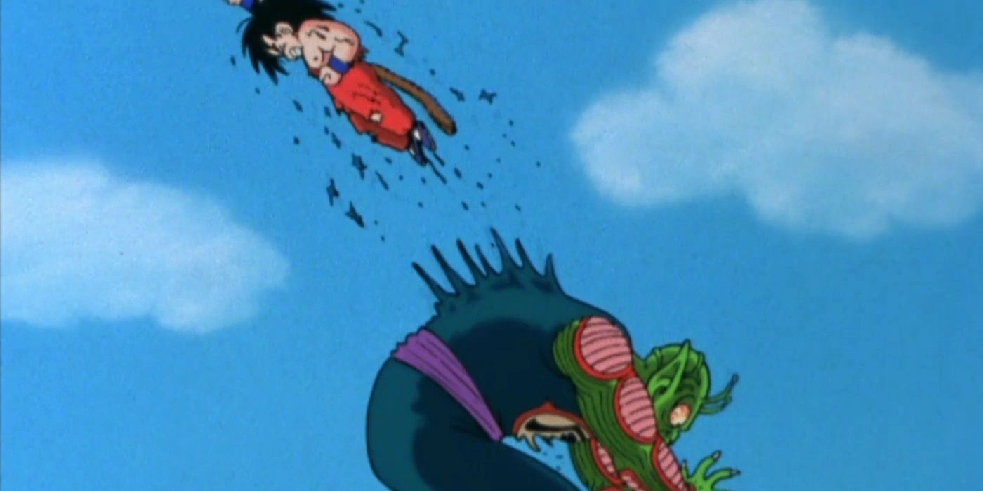 Goku dá um soco no Rei Demônio Piccolo em Dragon Ball.