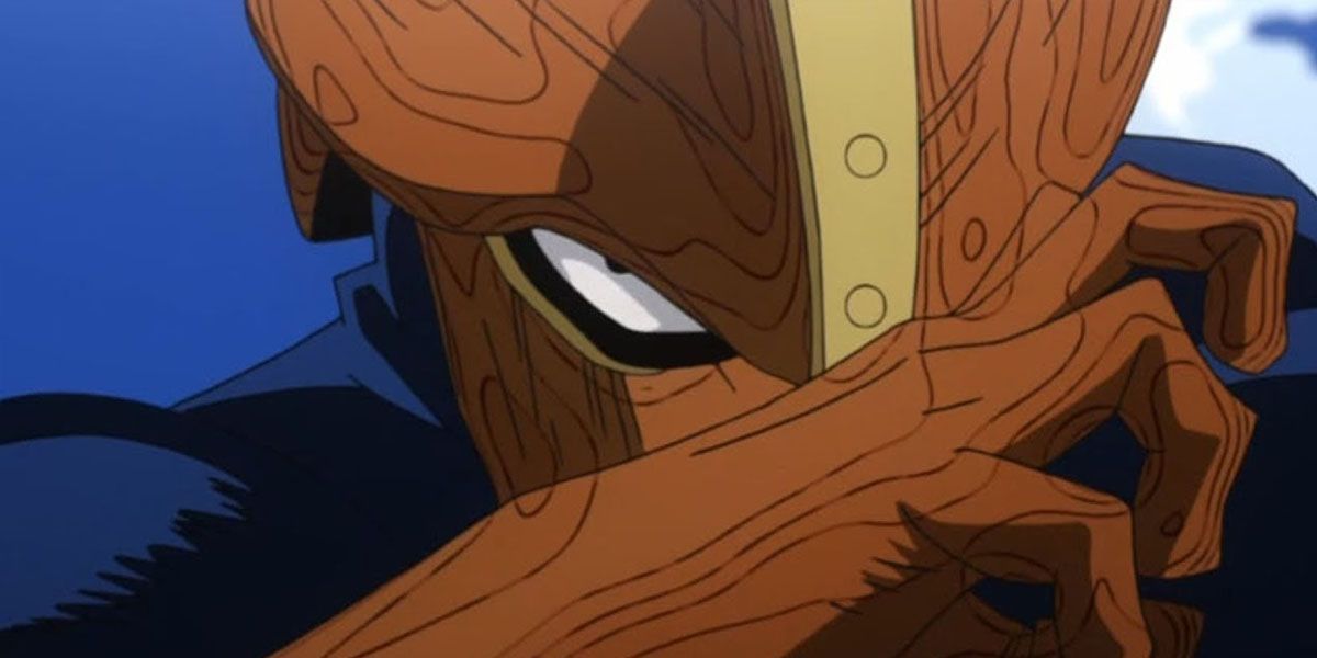 Kamui Woods with a hand over his face in My Hero Academia.