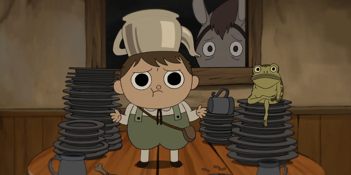 Greg standing on a table with plates in Over The Garden Wall