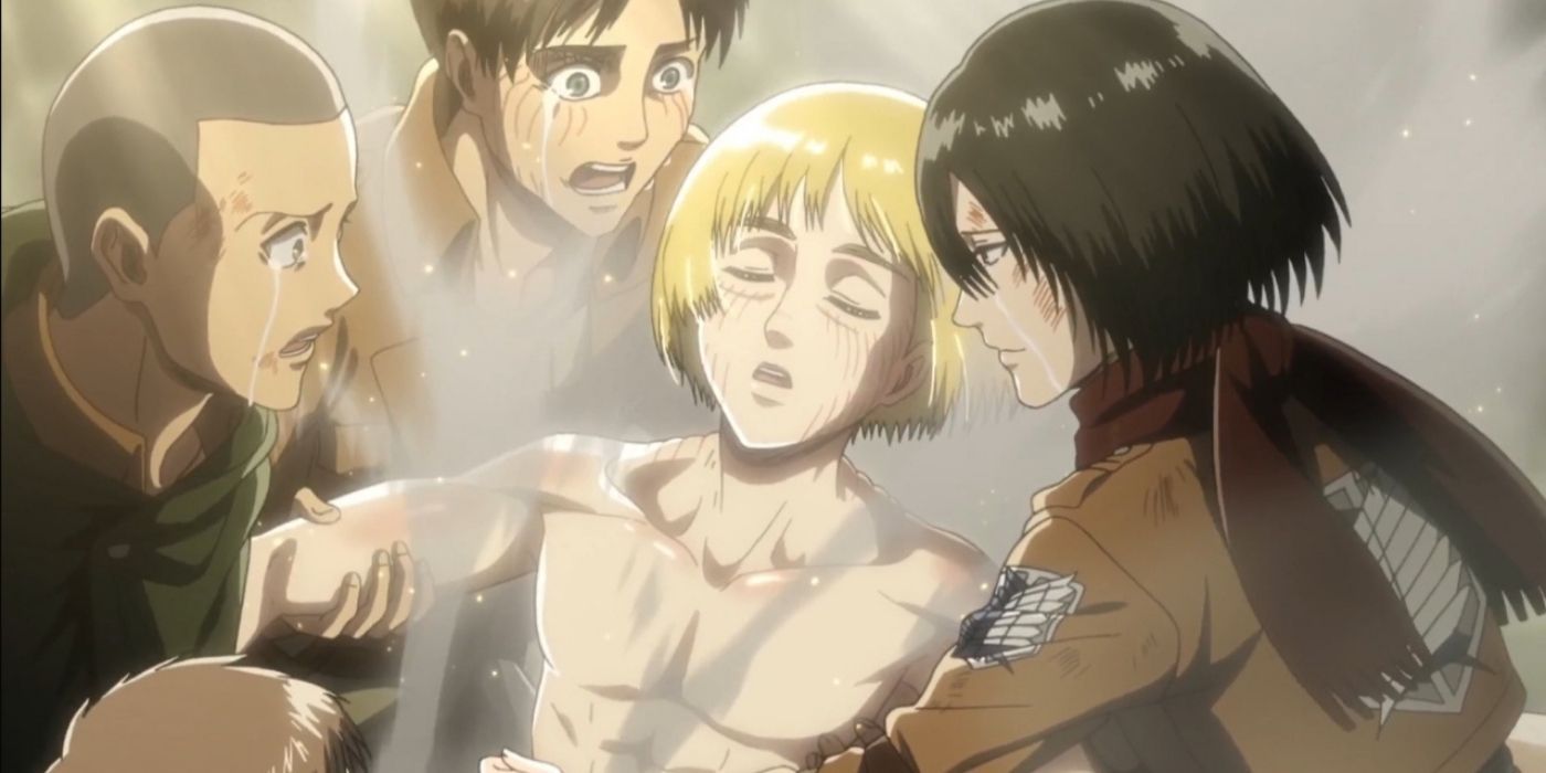 Armin Arlert surrounded by Connie Springer, Eren Jeager, and Mikasa Ackerman in Attack on Titan