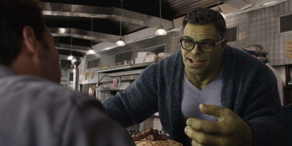 Professor Hulk smiles while talking with Scott Lang in a diner