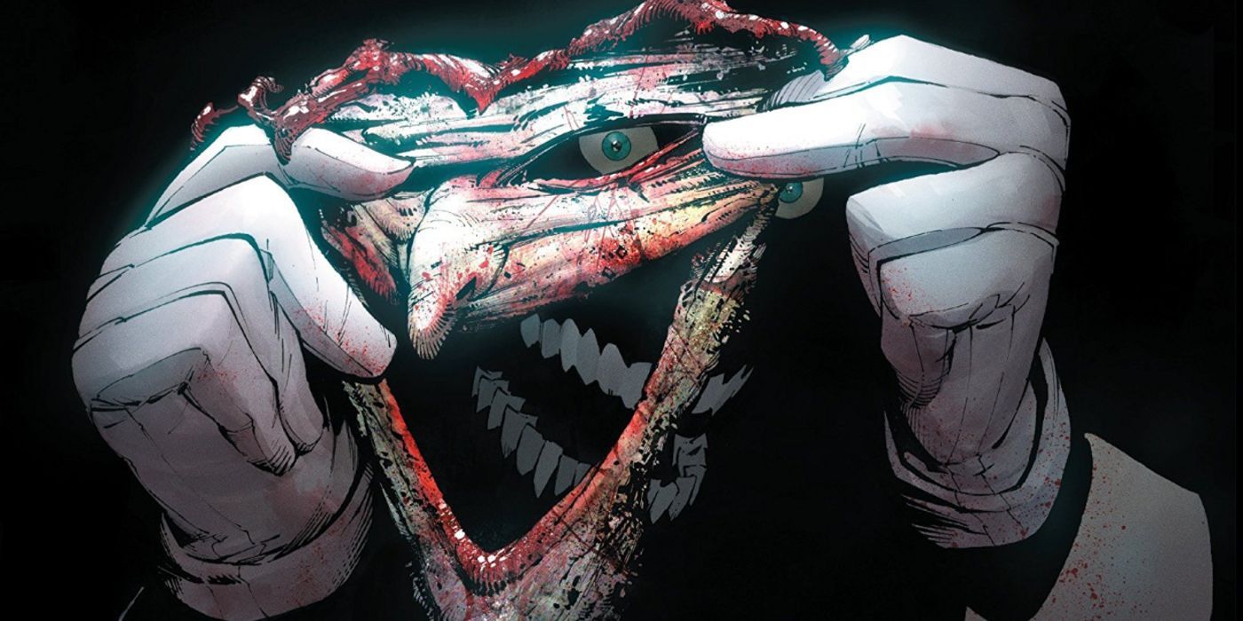 Joker holds his own face as a mask in DC Comics Death of the Family.
