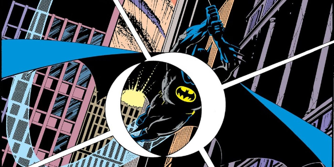 Marshall Rogers' art shows Batman swinging through Gotham, unaware a target is seeking him.