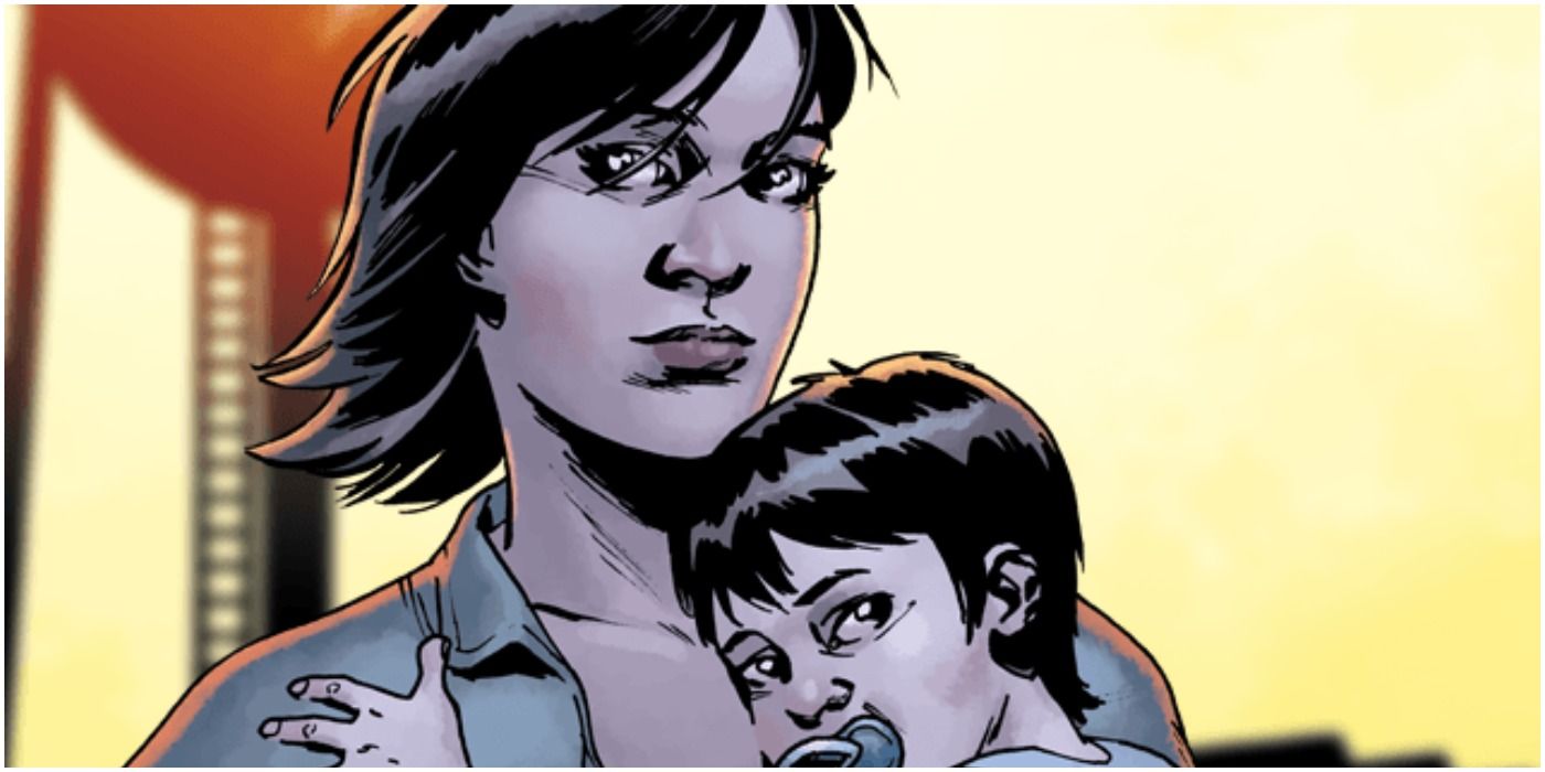 Maggie holding her child Hershel (comic)