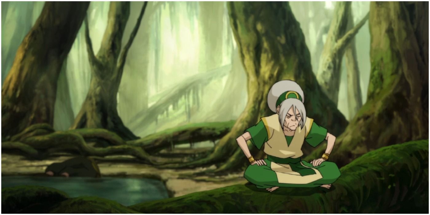 toph crouches in the foggy swamp