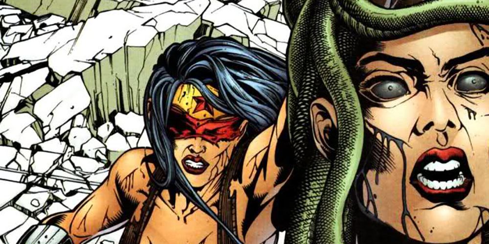 Wonder Woman Holds Up The Severed Head Of Medusa 