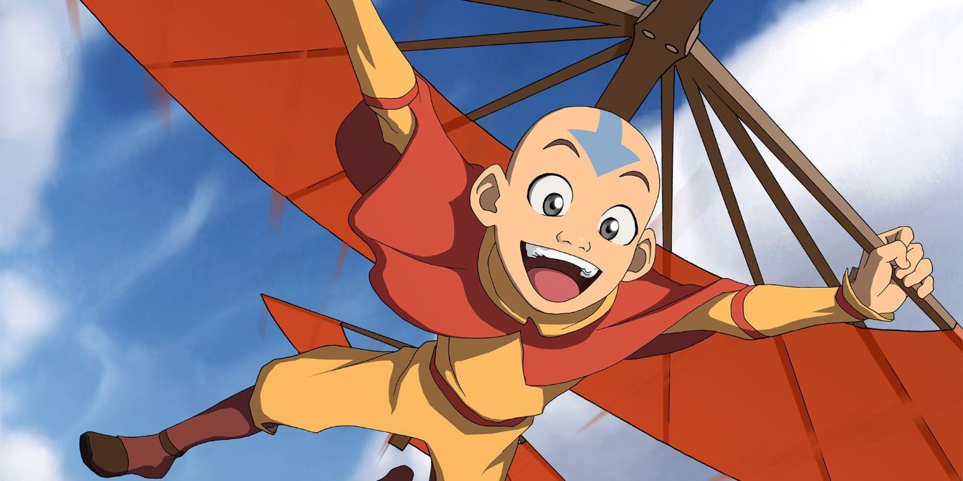 Avatar Aang smiling and gliding through the sky