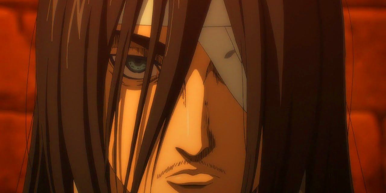Eren Yaeger scowling with hair covering his remaining eye.