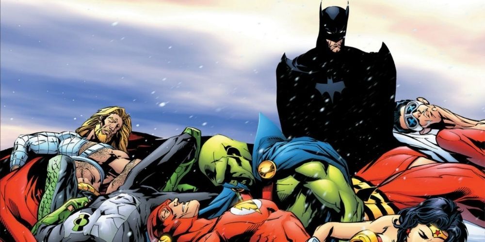 Batman looks down at a defeated Justice League in JLA Tower of Babel by DC Comics