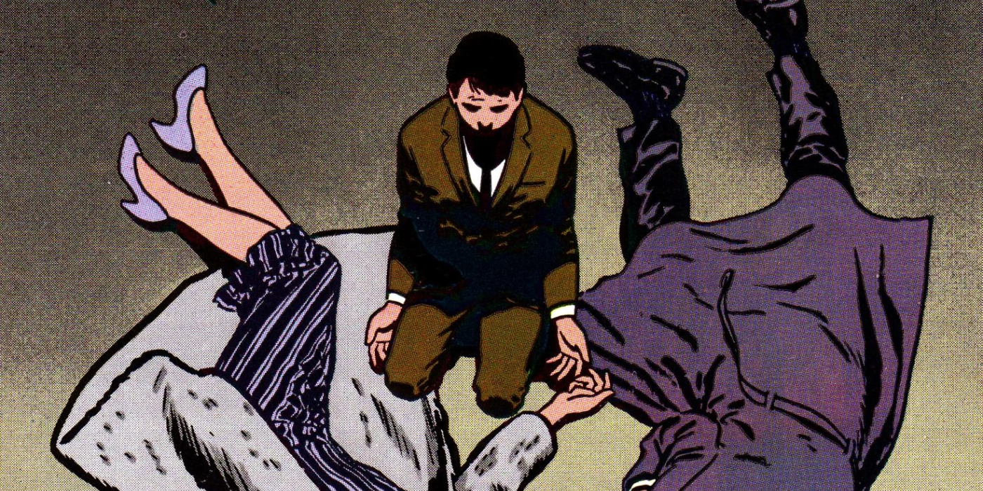Bruce Wayne kneeling by his parents' bodies in Batman: Year One
