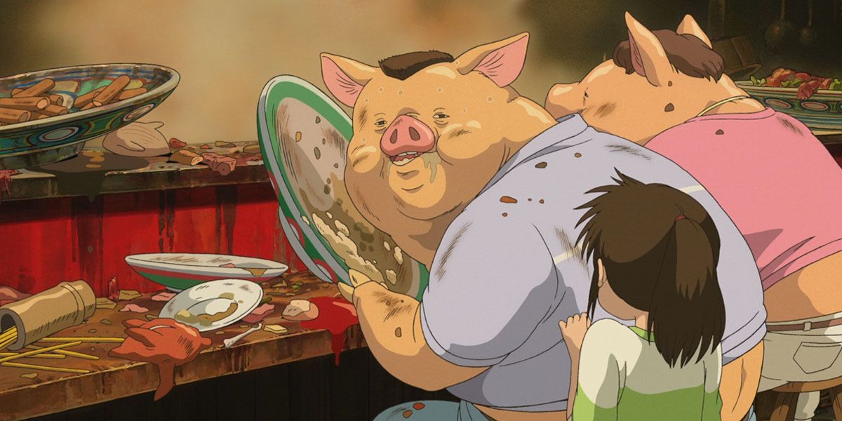 Chihiro looks at her parents after they were turned into pigs