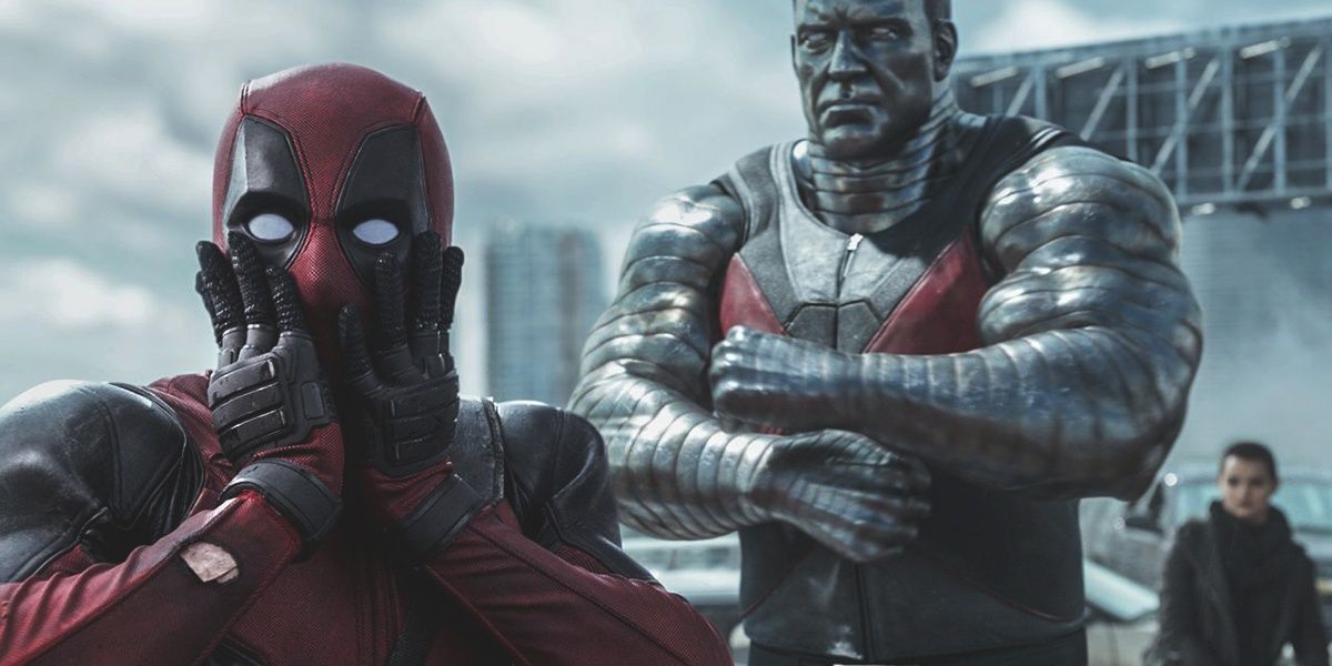 Deadpool feigns shock while Colossus stands behind him.