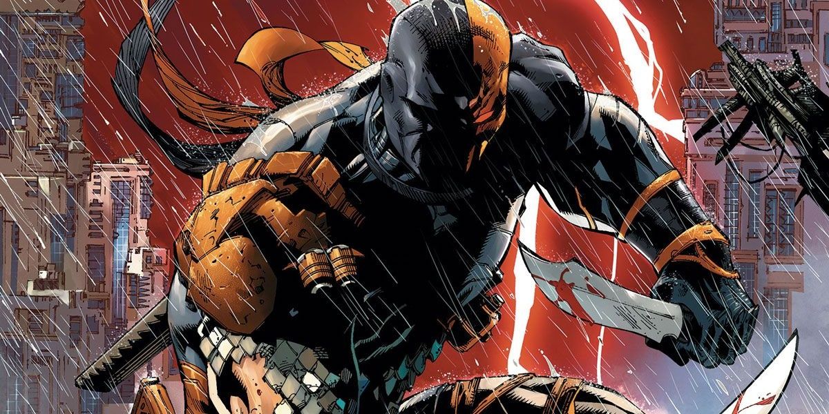 Deathstroke with bloody daggers in the rain