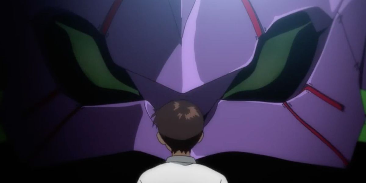 Shinji looks at his Evangelion Unit 01