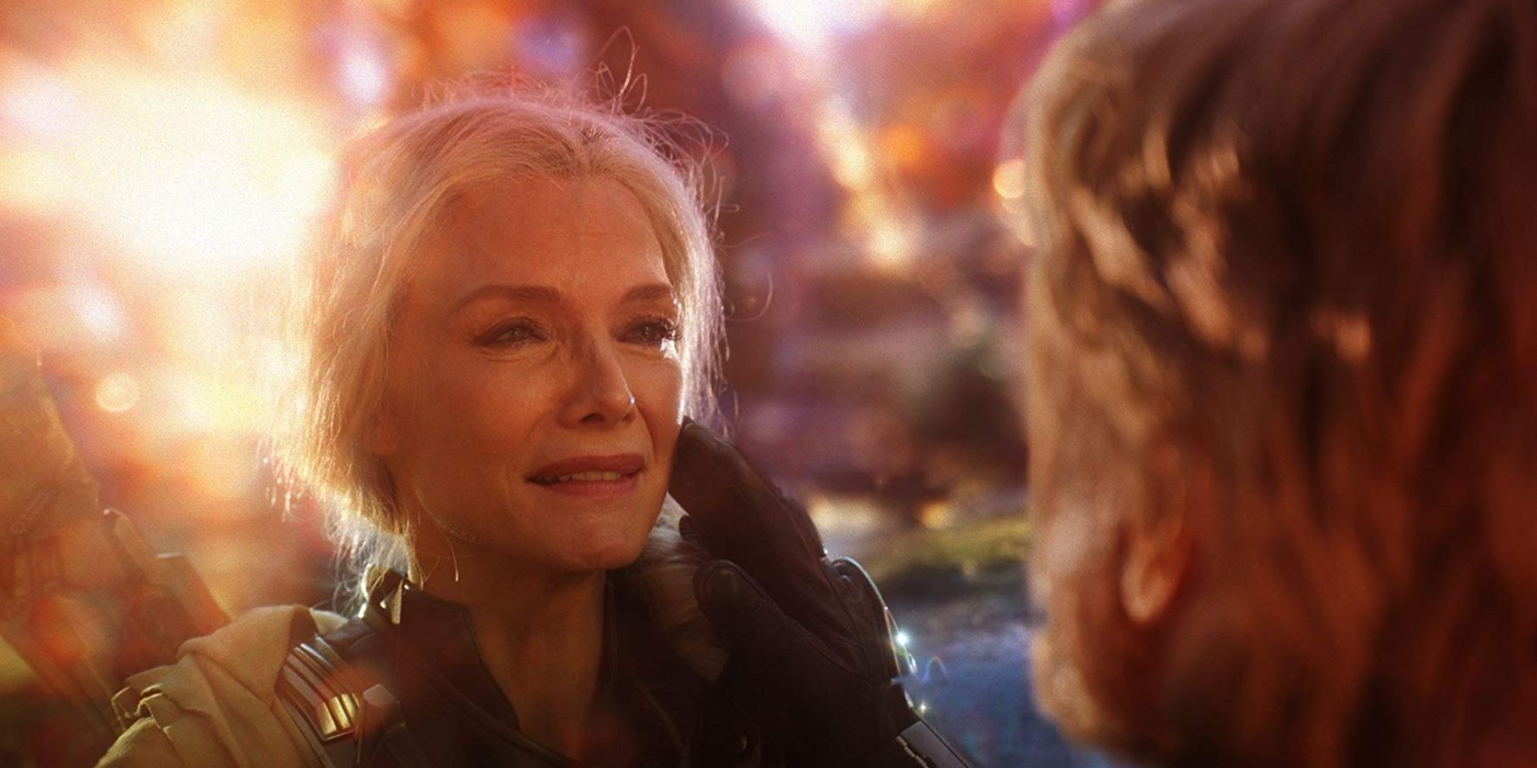 Hank Pym touches Janet Van Dyne's face as they reunite in the Quantum Realm in Ant-Man and the Wasp.