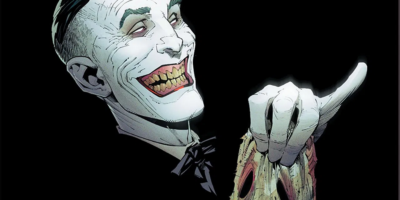 The Joker holding up his severed face in Endgame cover art.