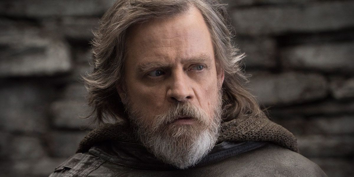 Older Luke Skywalker stares after being found by Rey in Star Wars: The Last Jedi