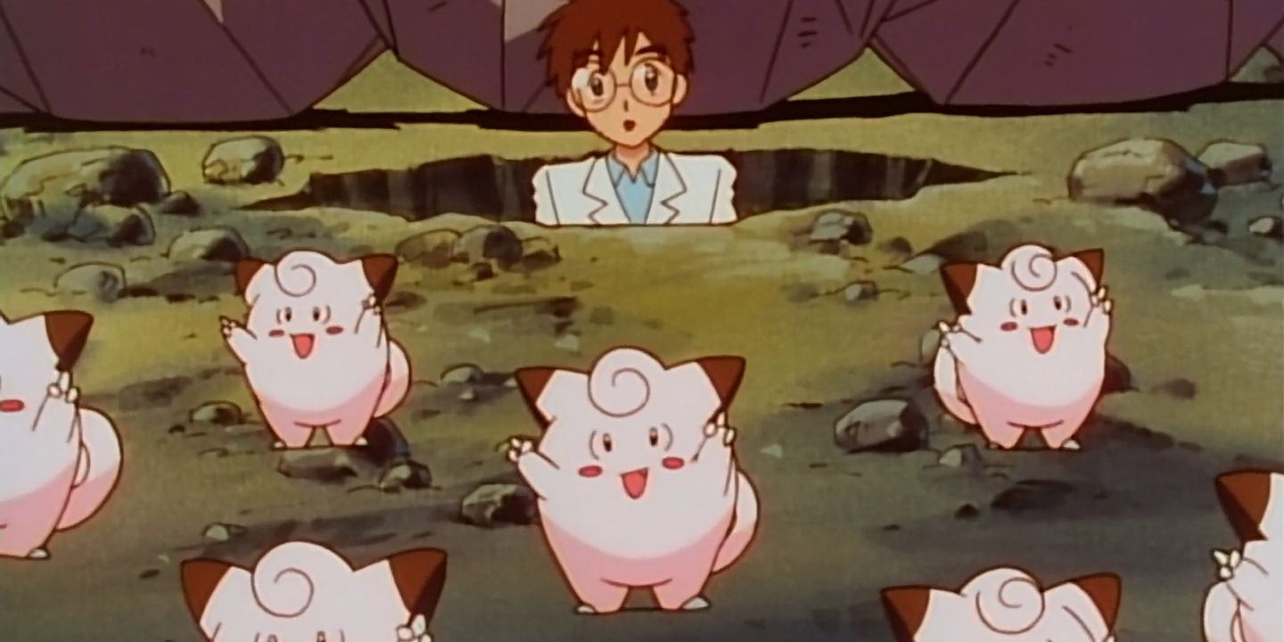 A Pokemon scientist plays with Clefairy in Pokemon anime