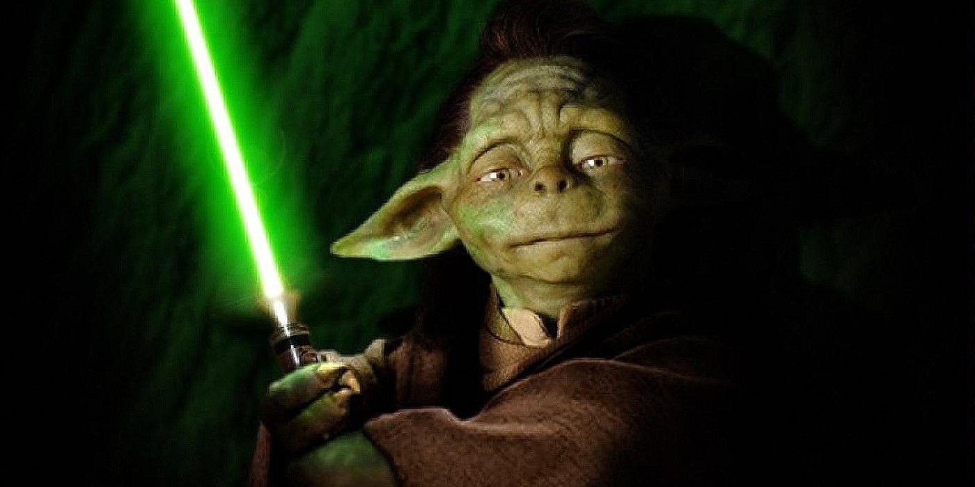 A Star Wars image features Yaddle with her green lightsaber