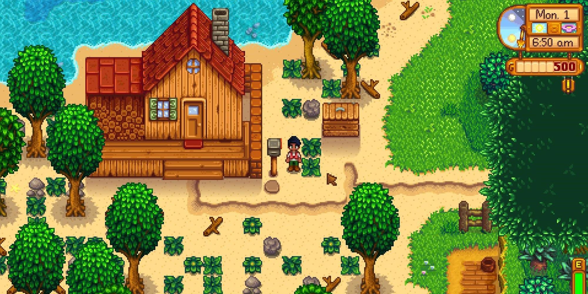 A screenshot of Stardew Valley's Beach farm, which includes a hut and several trees