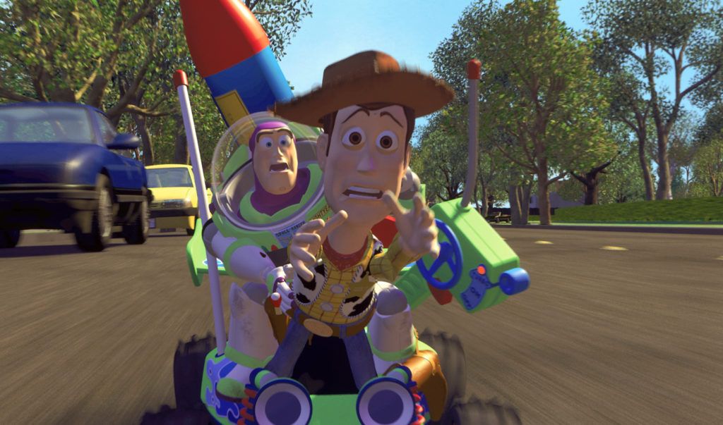 Woody and Buzz Lightyear traveling by roller skate in Toy Story