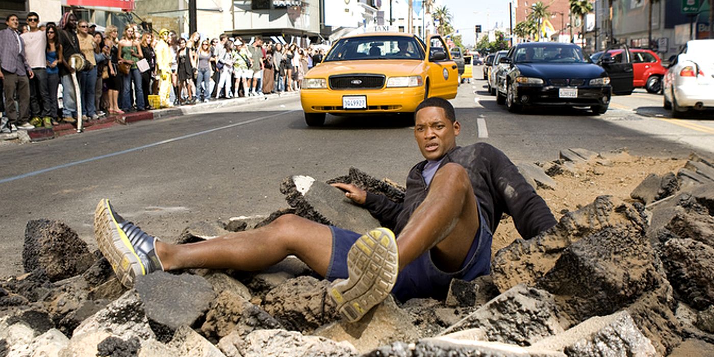 Will Smith in Hancock on street in rubble