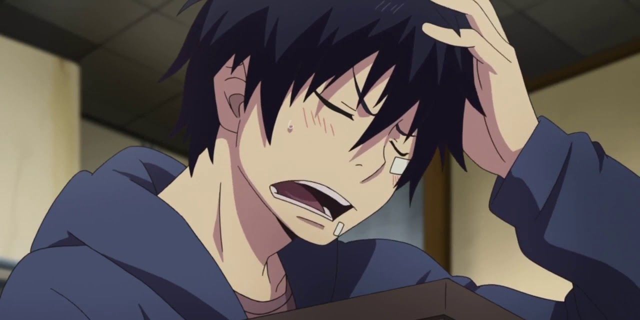 Blue Exorcist's Rin Okumura Rubbing His Injured Head