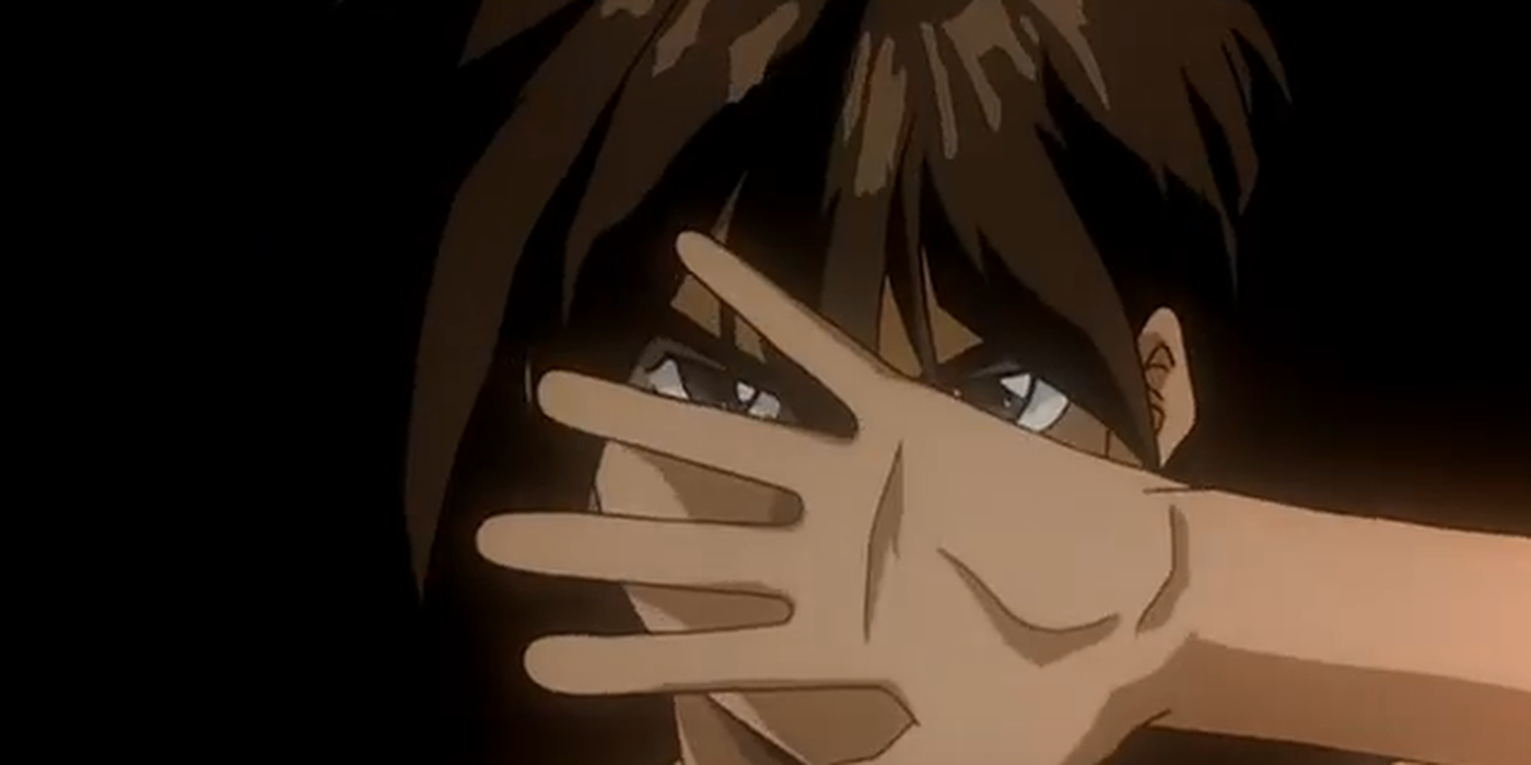 Heero Yuy moves his hand across his face in Gundam Wing's opening credits.