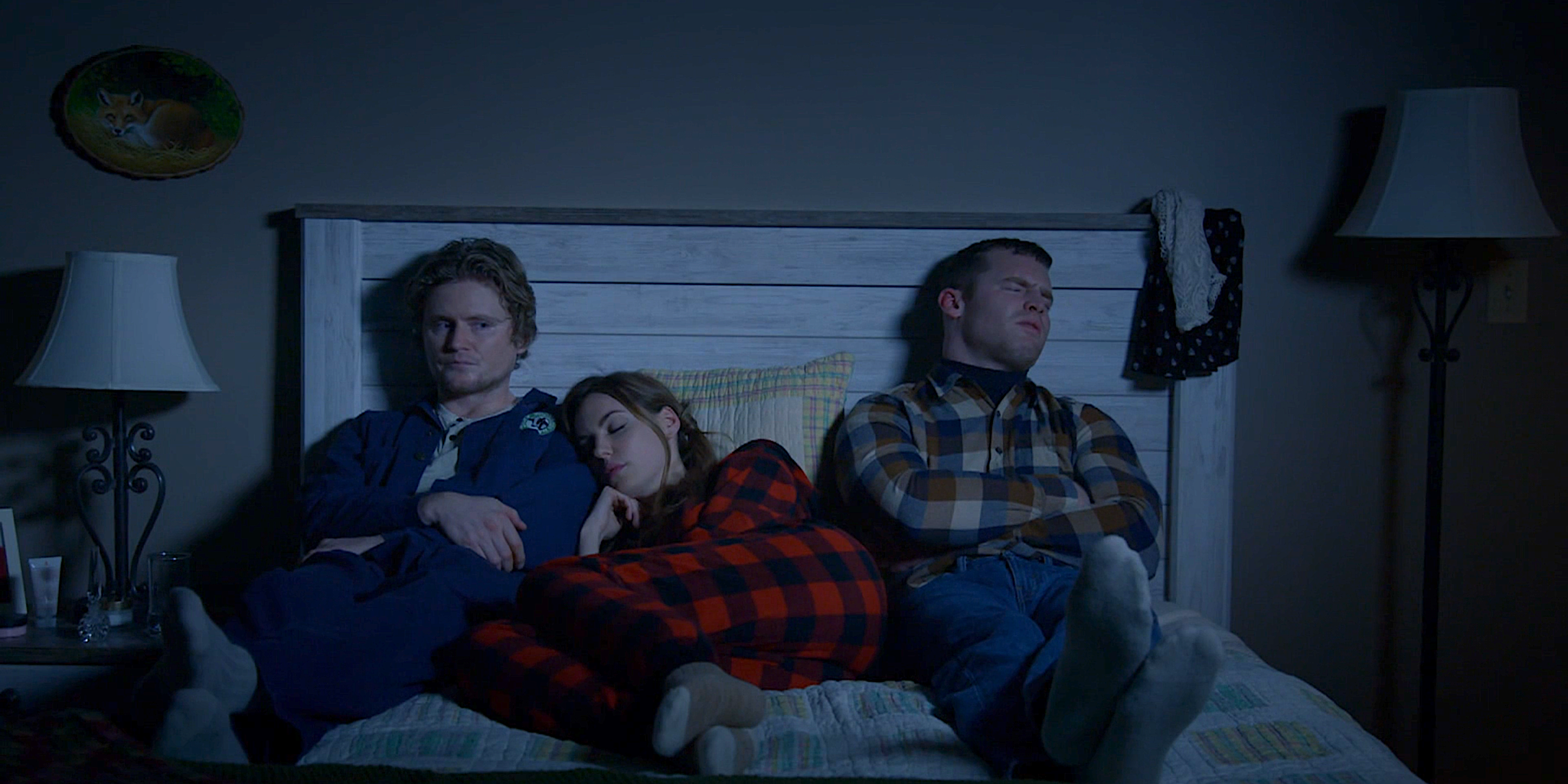 Daryl, Katy and Wayne all lying in bed at a sleepover