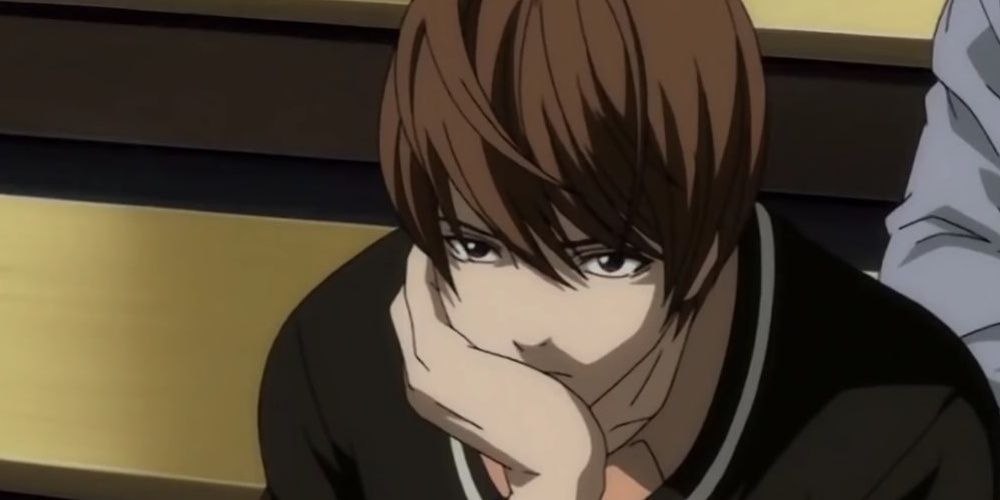 Light Yagami from Death Note with his hand on his face