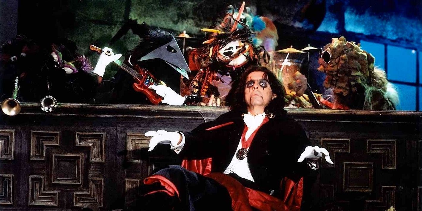 Alice Cooper surrounded by a melee of colorful Muppets