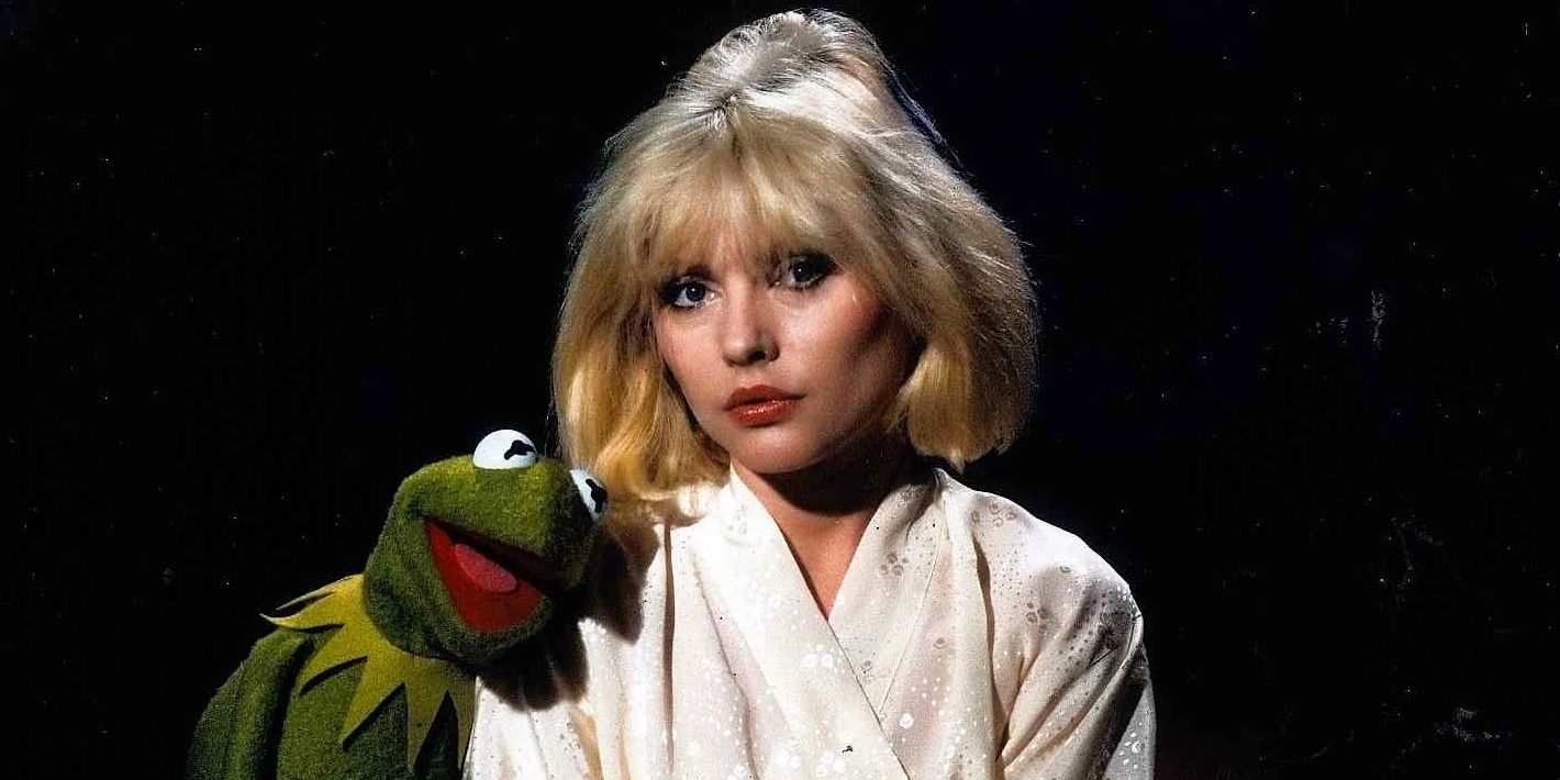 Singer Debbie Harry posing with Kermit the Frog