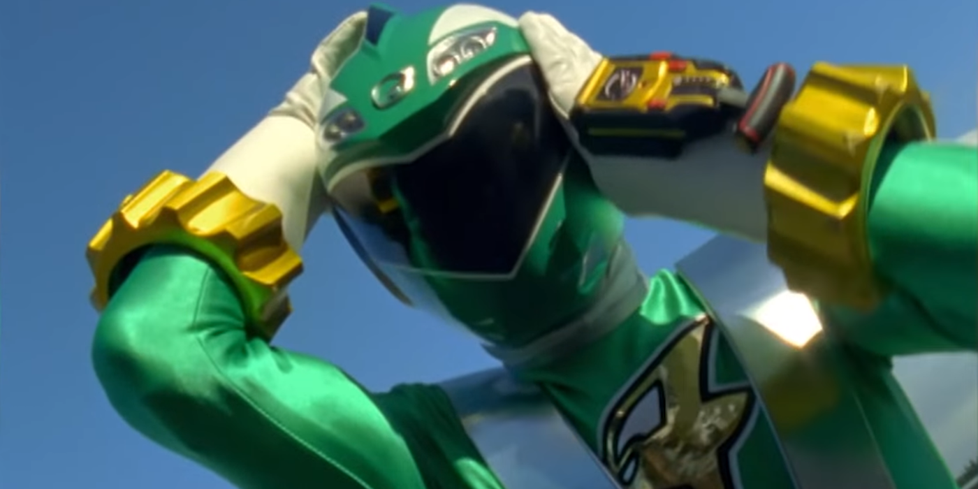 Power Rangers RPM Ziggy holding his helmet in place