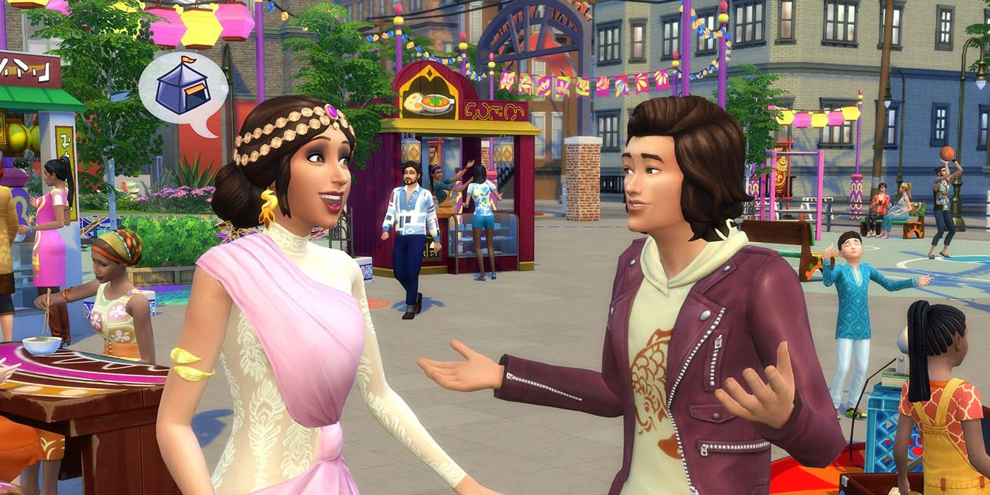 Sims 4: A Woman in pink and gold sari talks to a man in a maroon jacket.