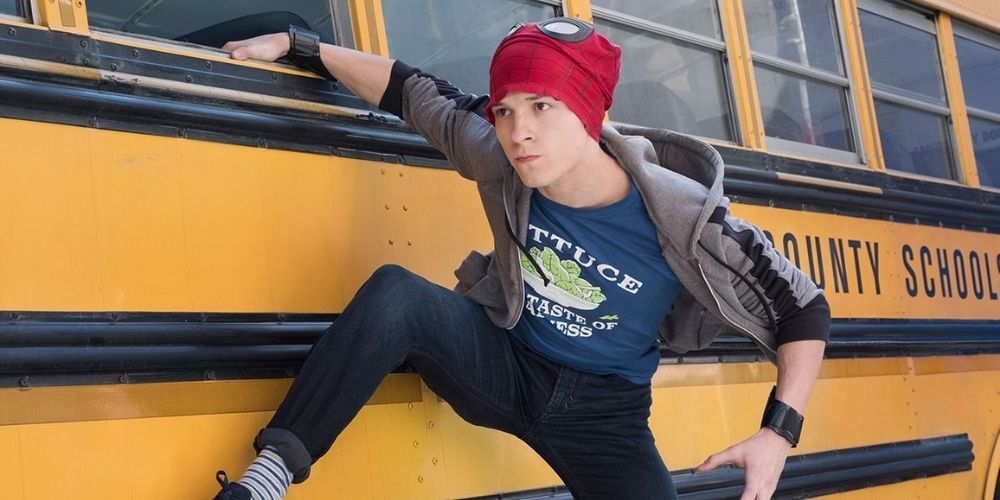 Spider-man-hanging-on-the-outside-of-a-school-bus