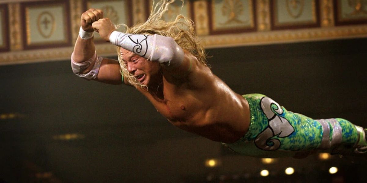 a wrestler flying through the air