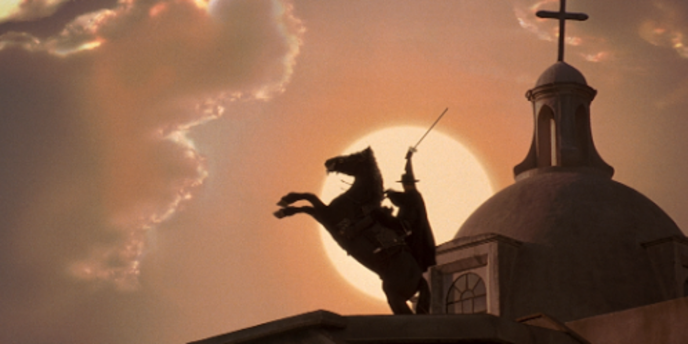 Zorro and his horse silhouetted against the sun