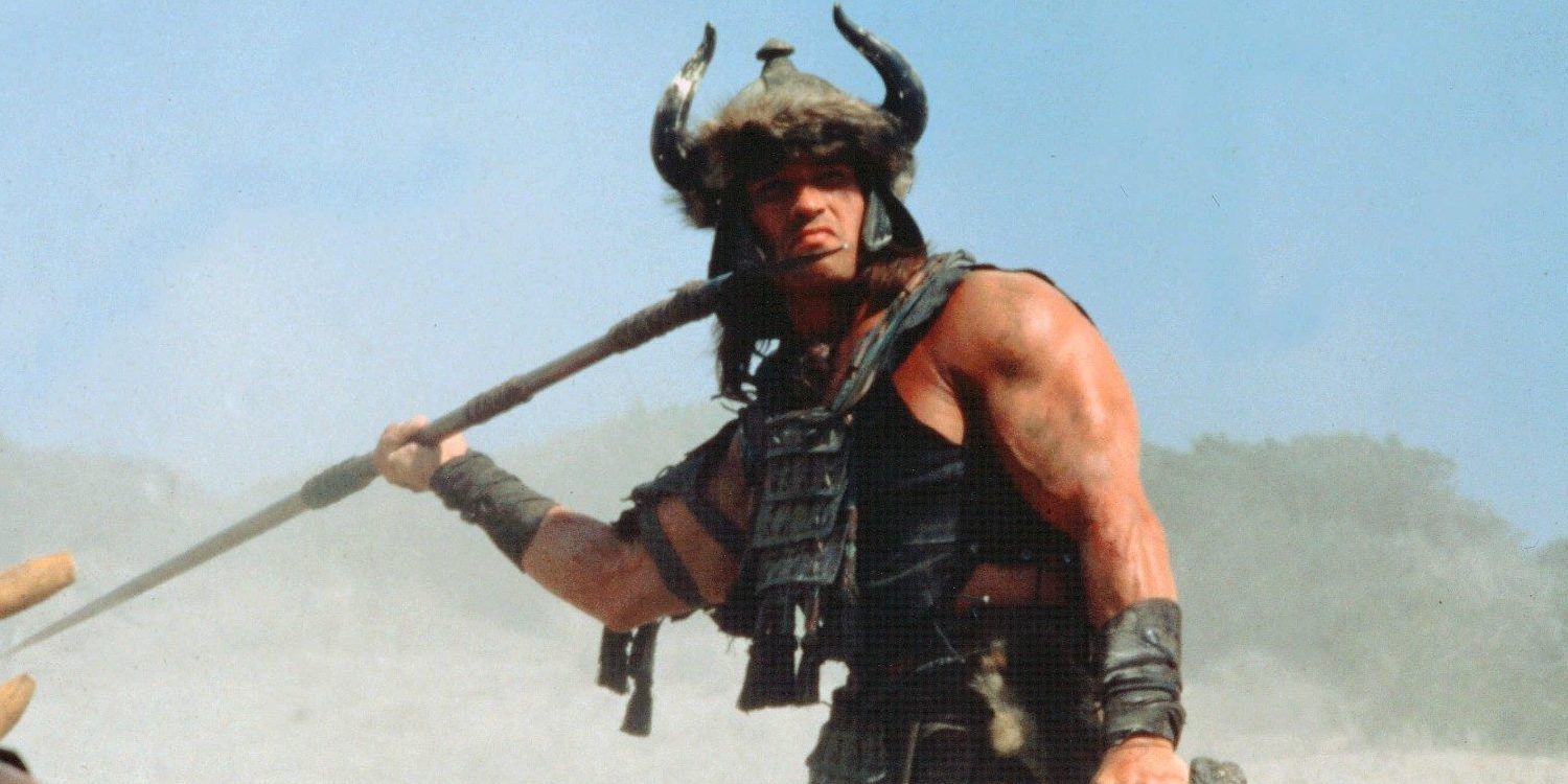 Conan wields a spear at the Battle of the Mounds in Conan the Barbarian.
