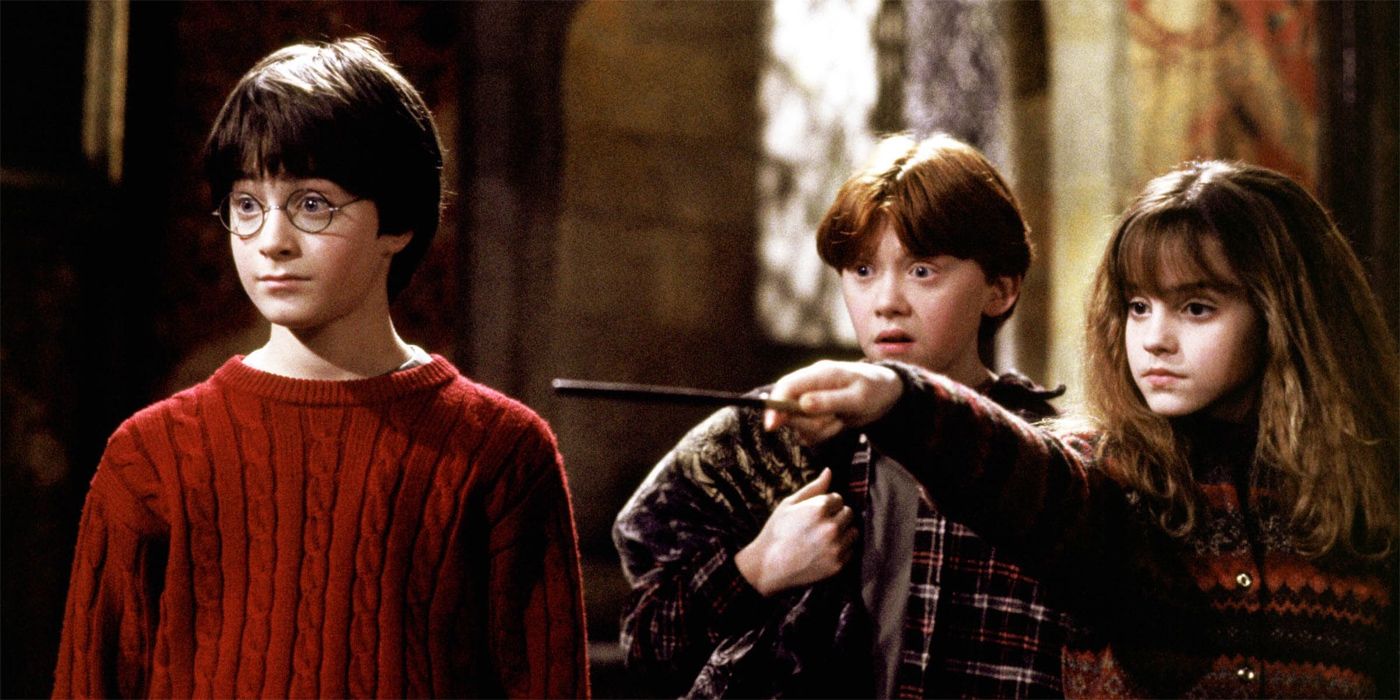 Hermione pointing her wand with Harry and Ron in The Philosopher's Stone