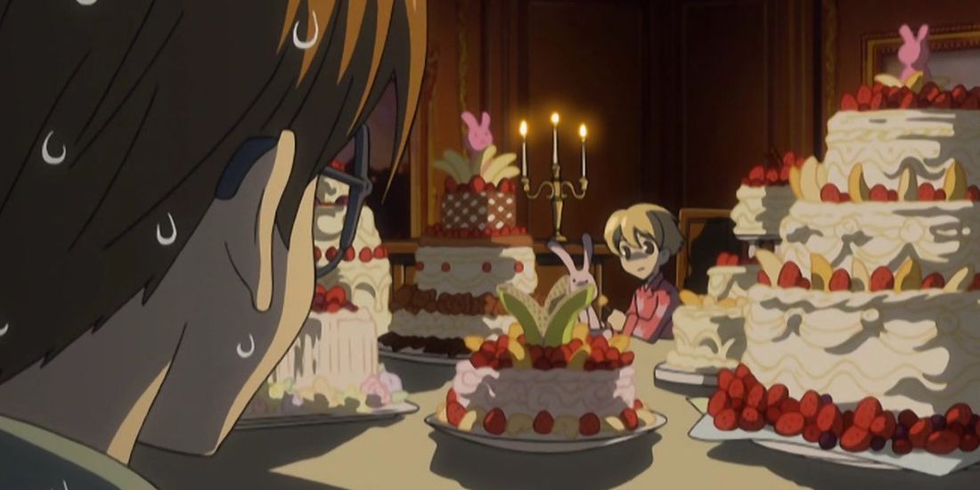 Honey Senpai with a table of sweets in Ouran High School Host Club.