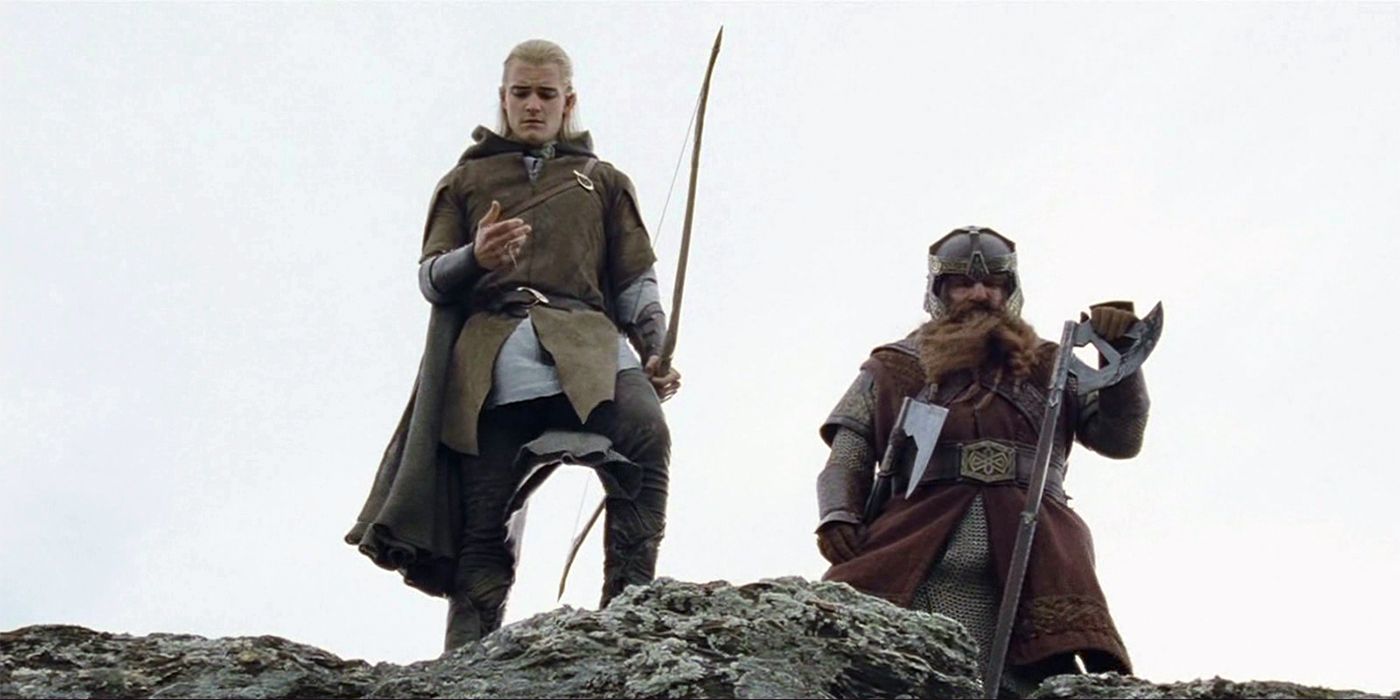 Gimli and Legolas atop a hill in The Lord of the Rings