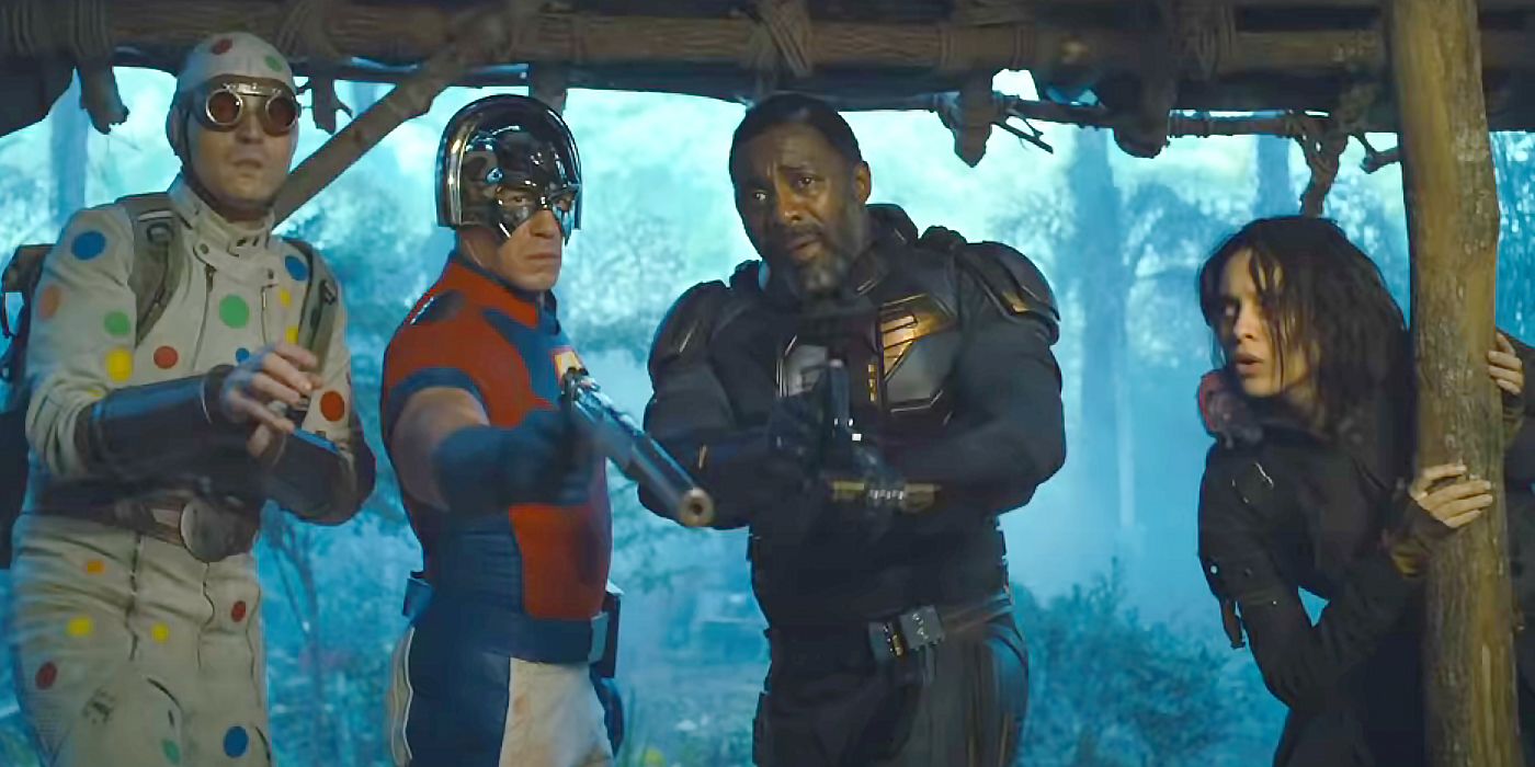 Task Force X members looking into a hut in The Suicide Squad