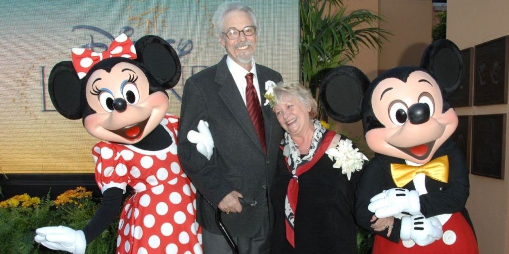mickey and minnie standing with voice actors