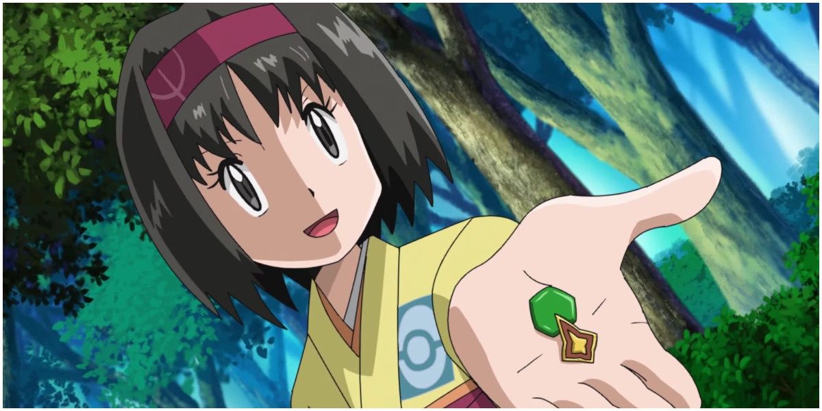 Erika handing out her gym's badge