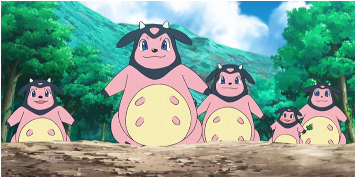 A herd of miltank from pokemon walking towards the camera