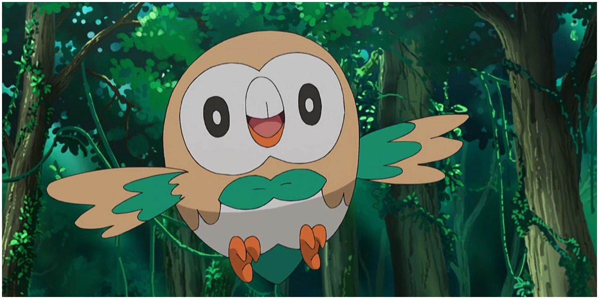 Rowlett is flying in a forest in the Pokemon anime